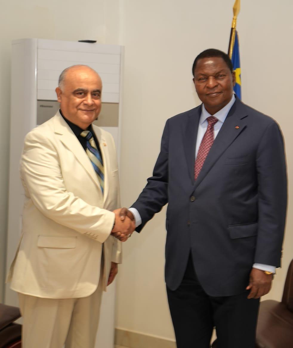 Two men posing, according to the caption the CEO of Numan Groupe and the Central African president.